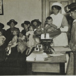 Baby weighing c.1915 LMA_4314_07_001_0003